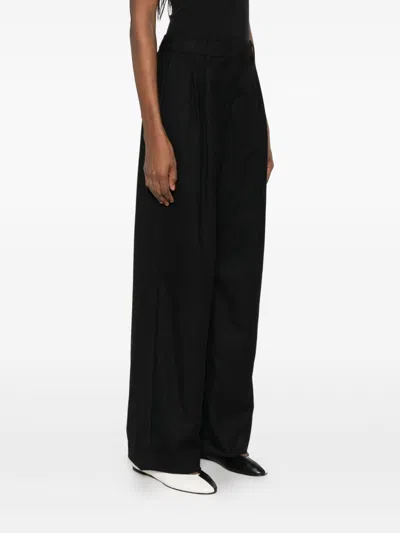 Dunst Pleated Trousers In Black