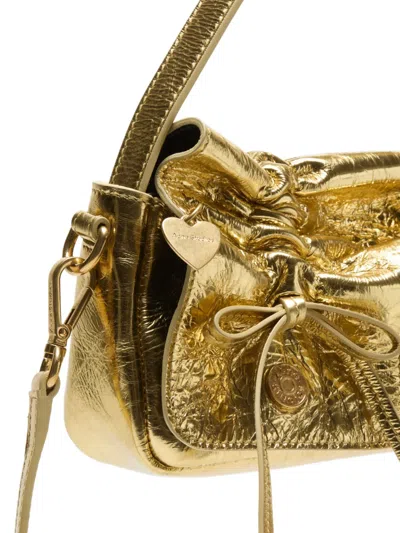 Acne Studios Drawstring Leather Shoulder Bag In Gold