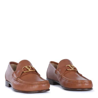 Valentino Garavani V-logo Embellished Full-grain Nubuck Loafers In Brown