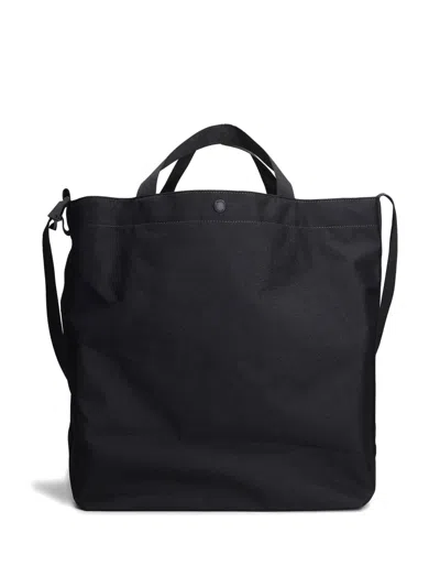 And Wander Top-handles Tote Bag In Black