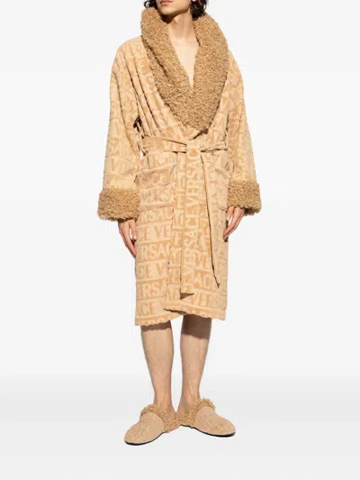 Versace Logo Curly Slippers In Nude