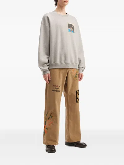 Khoki Floral-embroidery Patch-detail Trousers In Brown