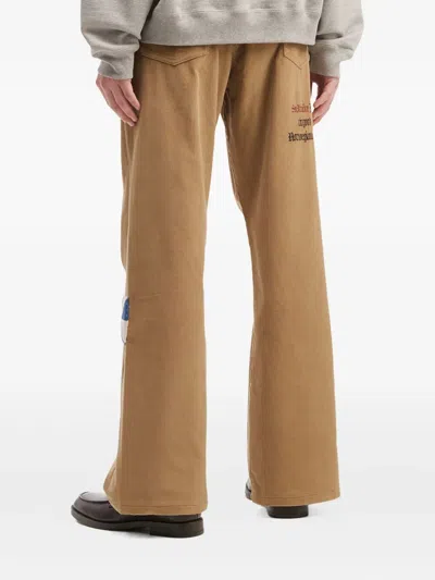 Khoki Floral-embroidery Patch-detail Trousers In Brown