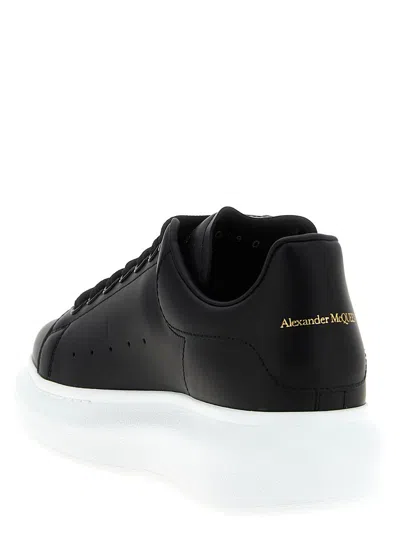 Alexander Mcqueen Black Low Top Sneakers With Logo Lettering On Tongue And Heel In Leather Woman In Black
