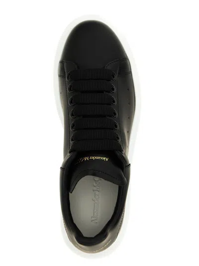 Alexander Mcqueen Black Low Top Sneakers With Logo Lettering On Tongue And Heel In Leather Woman In Black