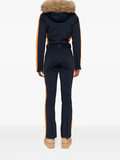 Goldbergh Suvi Belted Hooded Plush-trimmed Padded Down Ski Suit In Blue