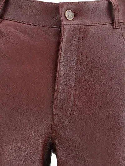 Chloé Women Flared Lambskin Leather Trousers In Burgundy