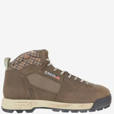 Autry Low Top Sneakers With Round Toe And Ridged Sole In Brown