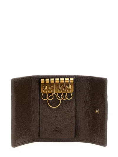 Gucci Gg Supreme Fabric And Leather Key Ring In Brown