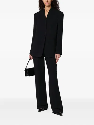 Loulou De Saison Textured Side-pocket Trousers In Black