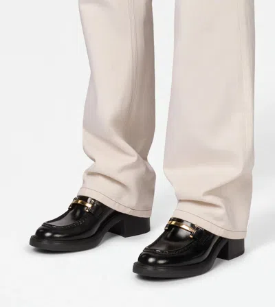 Tod's Block Heel Round Toe Loafers With Hardware In Black