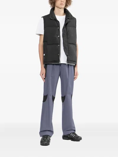 Izzue Logo-embossed Gilet In Black