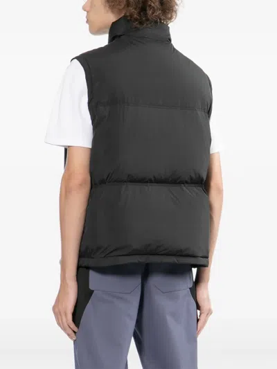 Izzue Logo-embossed Gilet In Black