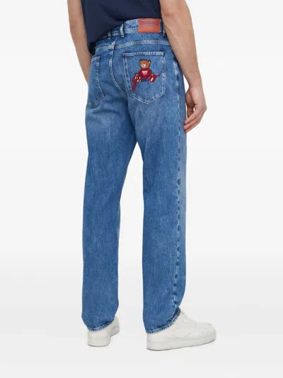 Guess Usa Bear-embroidered Jeans In Blue