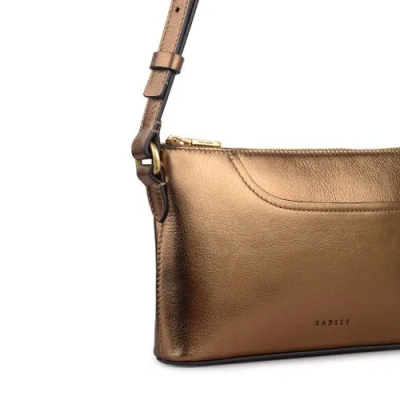 Radley Pockets In Gold