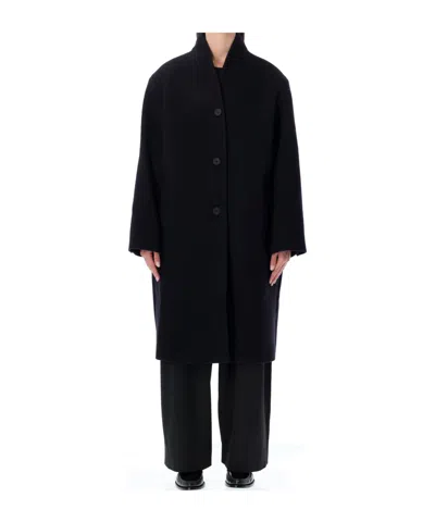 Studio Nicholson Long Coat With Structured Shoulders And Pockets In Black
