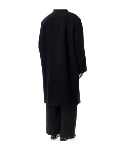 Studio Nicholson Long Coat With Structured Shoulders And Pockets In Black