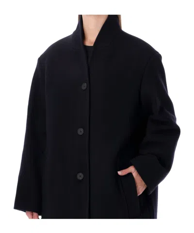Studio Nicholson Long Coat With Structured Shoulders And Pockets In Black