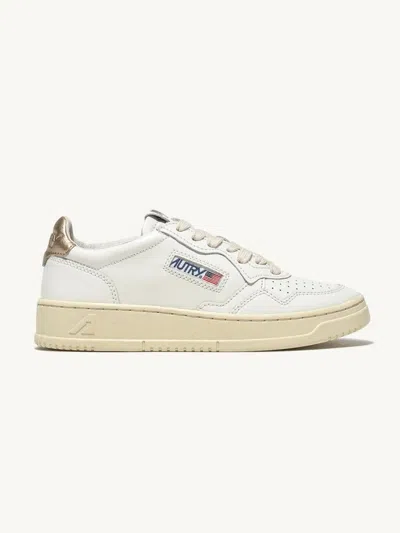 Autry Medalist Low Sneakers In White And Metallic Gold Leather In White