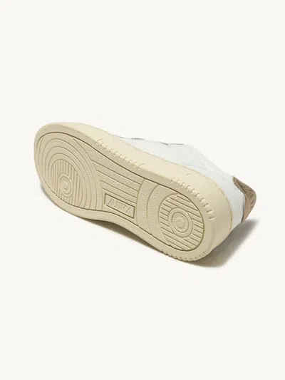 Autry Medalist Low Sneakers In White And Metallic Gold Leather In White