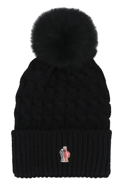 Moncler Wool Hat Featuring Cable Knit And Pom Detail In Black