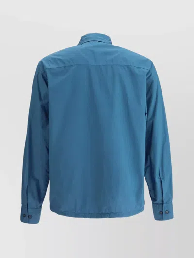 C.p. Company Button-up Casual Jacket With Flap And Zipper Pockets In Blue