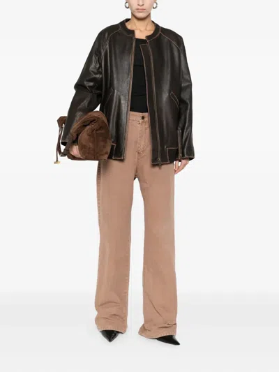 Rough Rust Jeans In Brown