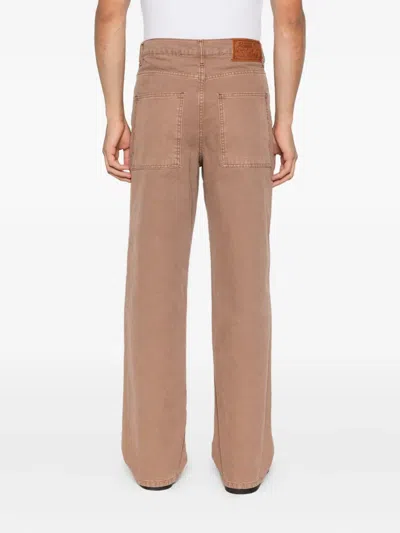 Rough Rust Jeans In Brown