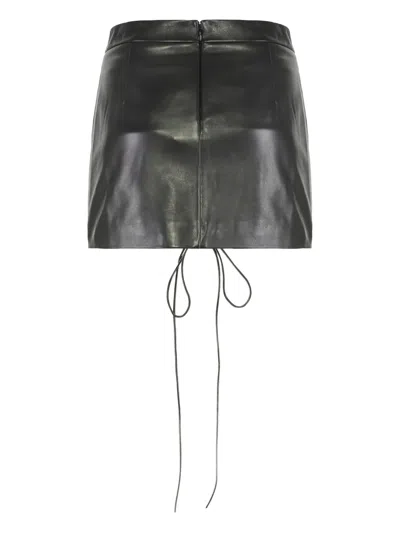 Les Filles D'eva Lace-up Mini Skirt In Black