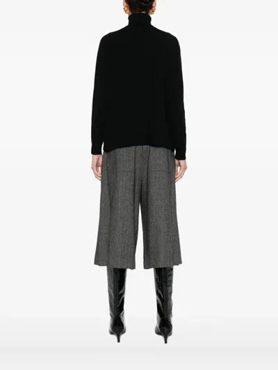 Solotre Roll-neck Sweater In Black