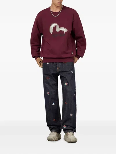 刺绣喇叭牛仔裤