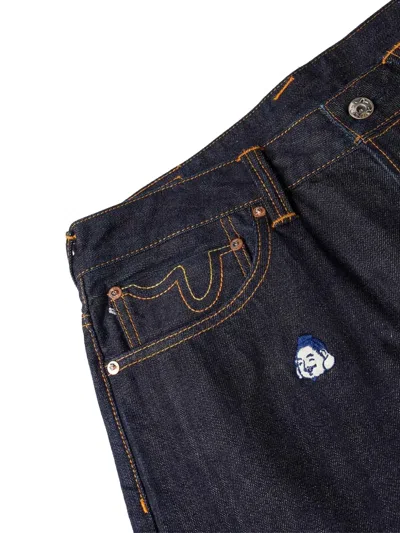 刺绣喇叭牛仔裤