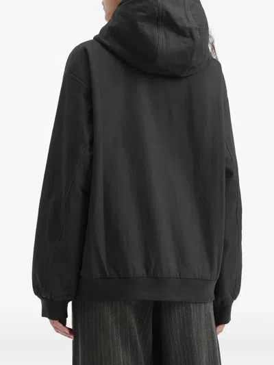 Tout A Coup Hooded Jacket In Black