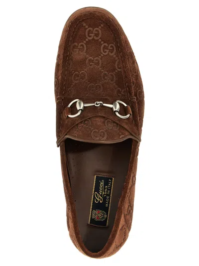 Gucci Men Suede Loafers With All-over Gg Motif In Brown