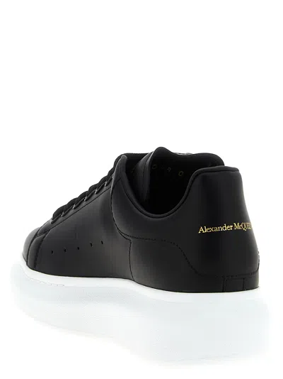 Alexander Mcqueen Black Low Top Sneakers With Logo Lettering On Tongue And Heel In Leather Woman In Black