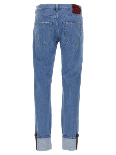 Gucci Blue Jeans With Logo Patch On The Rear And Web Turn-up Hem In Denim Man In Blue