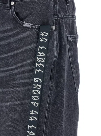 44 Label Group Men Black Jeans With Logo Patch On The Rear And Side Strap With Logo In Denim Man In Black