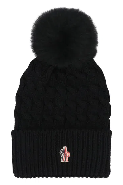 Moncler Wool Hat Featuring Cable Knit And Pom Detail In Black