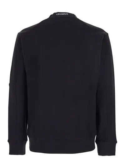 C.p. Company Black Crew Neck Sweater With Logo Patch Applied On The Sleeve In Cotton Man In Black