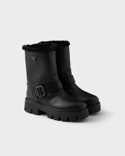 Prada Stiefeletten Aus Leder Und Lammfell In Black