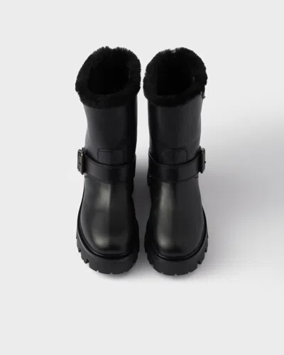 Prada Stiefeletten Aus Leder Und Lammfell In Black