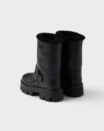 Prada Stiefeletten Aus Leder Und Lammfell In Black