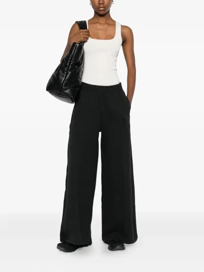 Adidas Originals Three-stripe Logo Trousers In Black