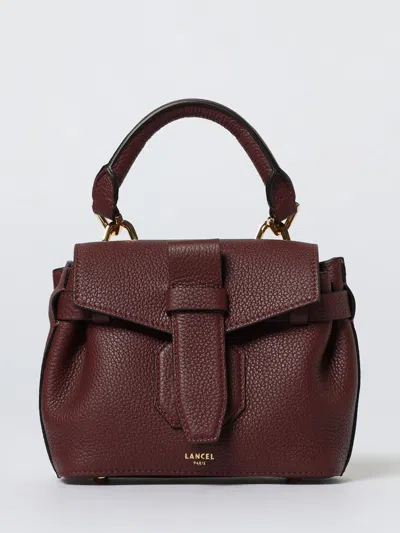 Lancel Hand Held Bag. In Burgundy