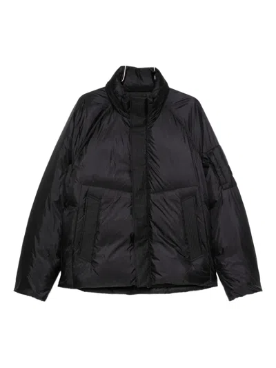 C.p. Company Quilted Panelled Jacket In Black