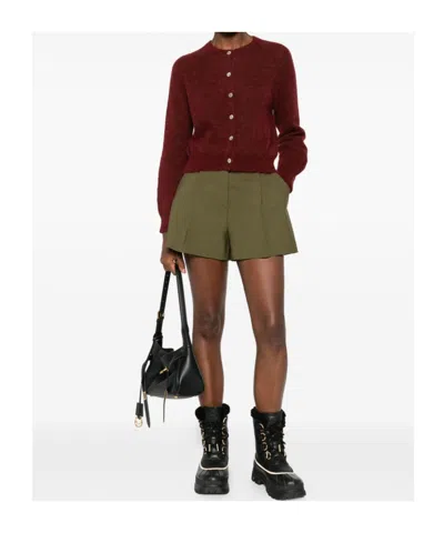 Msgm Pleated-panel Ribbon-trimmed Shorts In Green