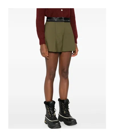Msgm Pleated-panel Ribbon-trimmed Shorts In Green