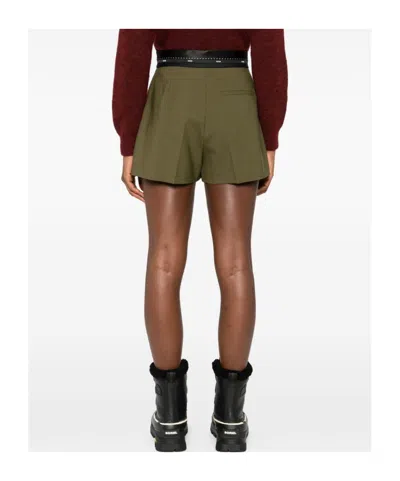 Msgm Pleated-panel Ribbon-trimmed Shorts In Green