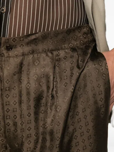 Saint Laurent Button-fastening Trousers In Brown