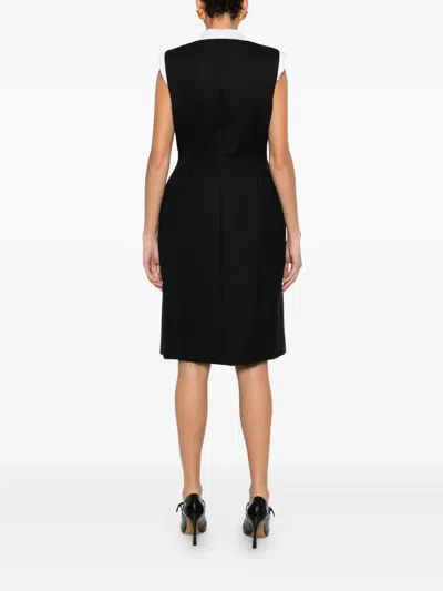 Moschino Stylish Sleeveless Dress Featuring Flap Pockets In Black